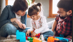 Parents teaching child